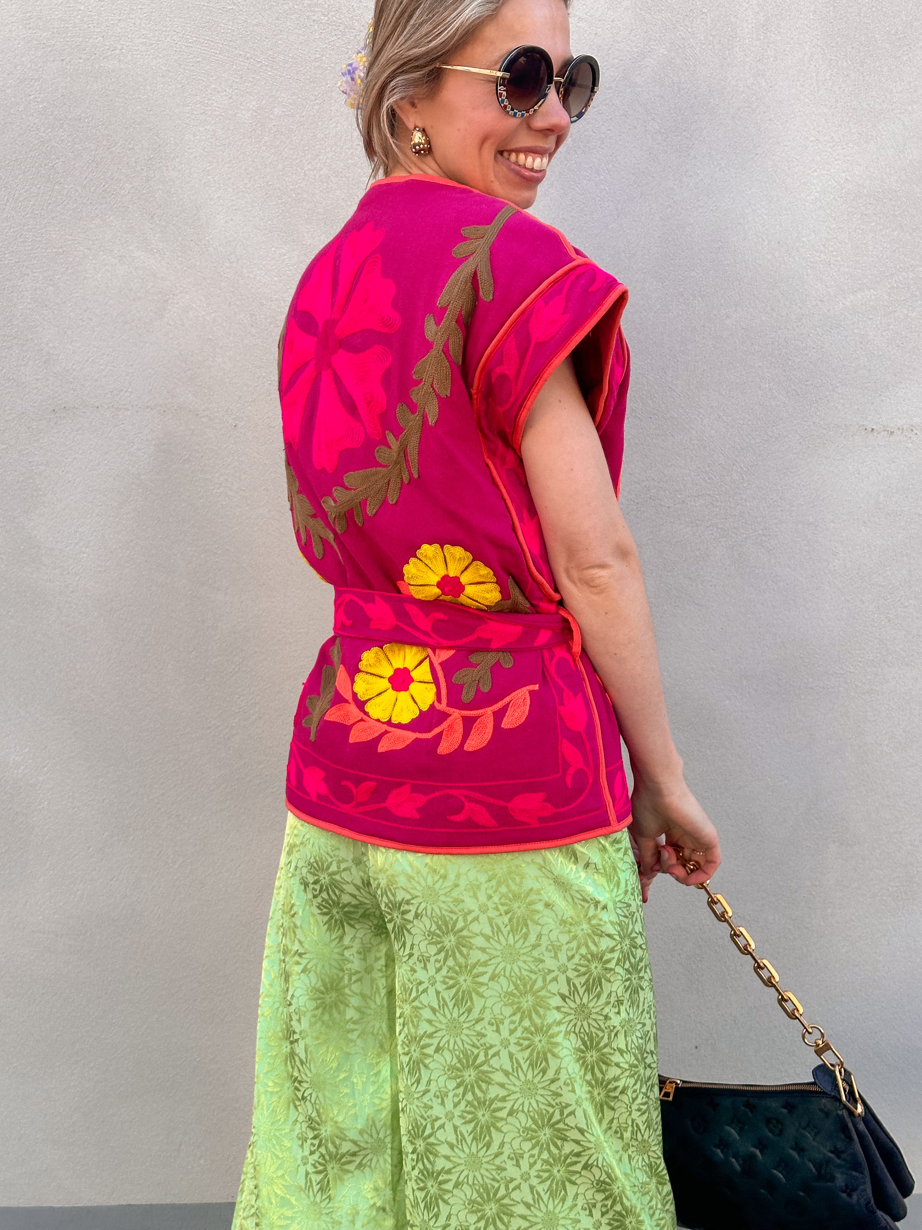 Isla gilet met lint fuchsia