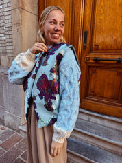 Metallic mouwloos jasje blauw