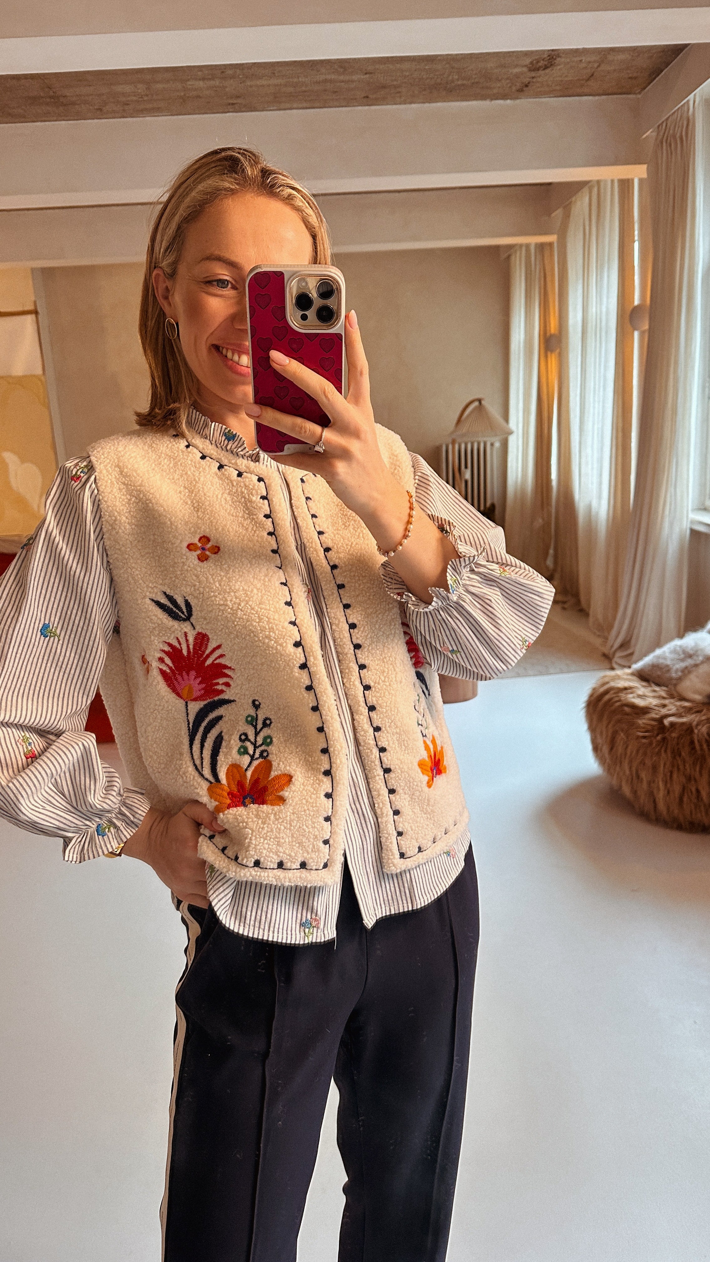 Aria teddy gilet gebloemd oranje