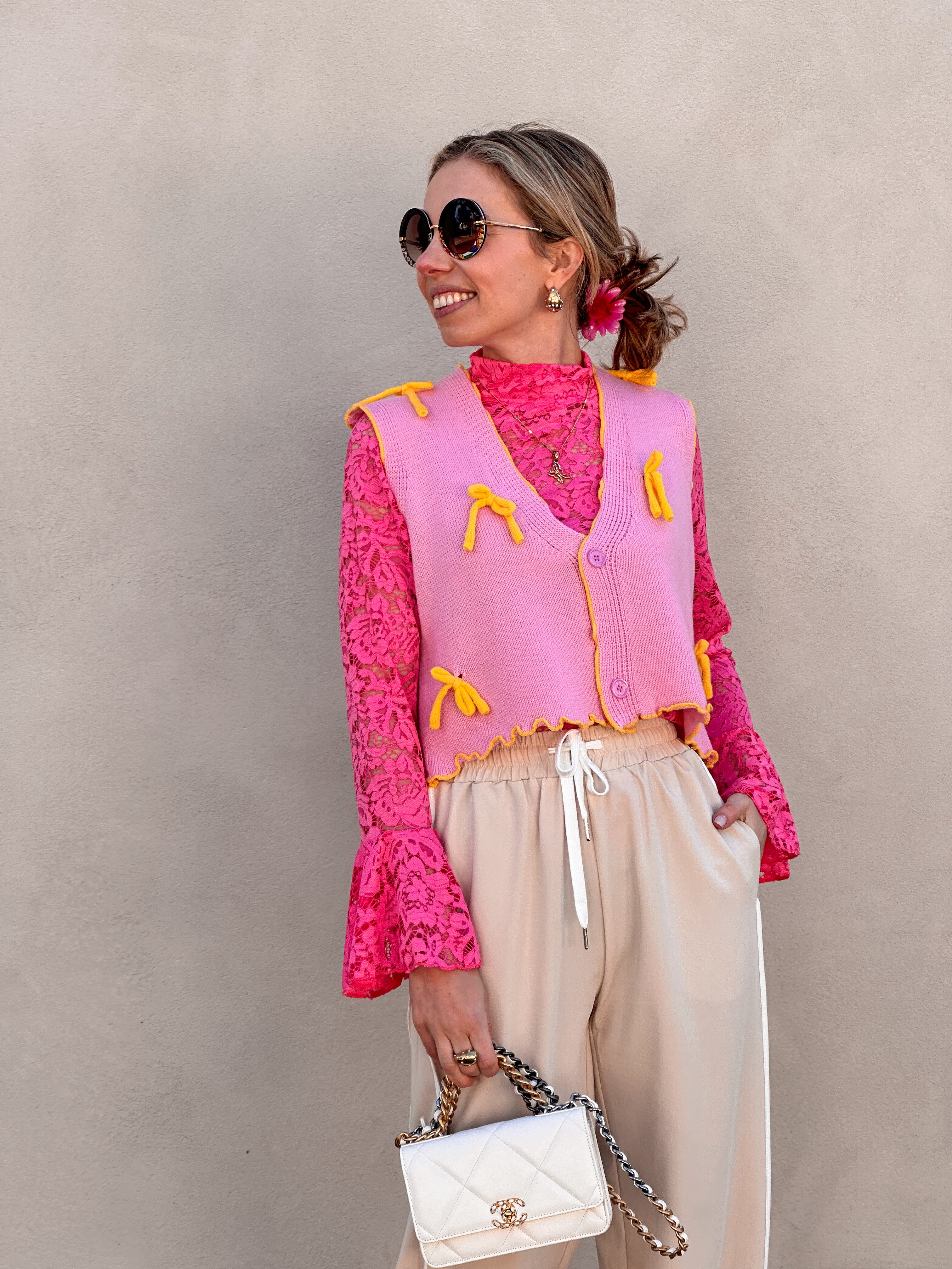 Bibi gilet roze met strikjes