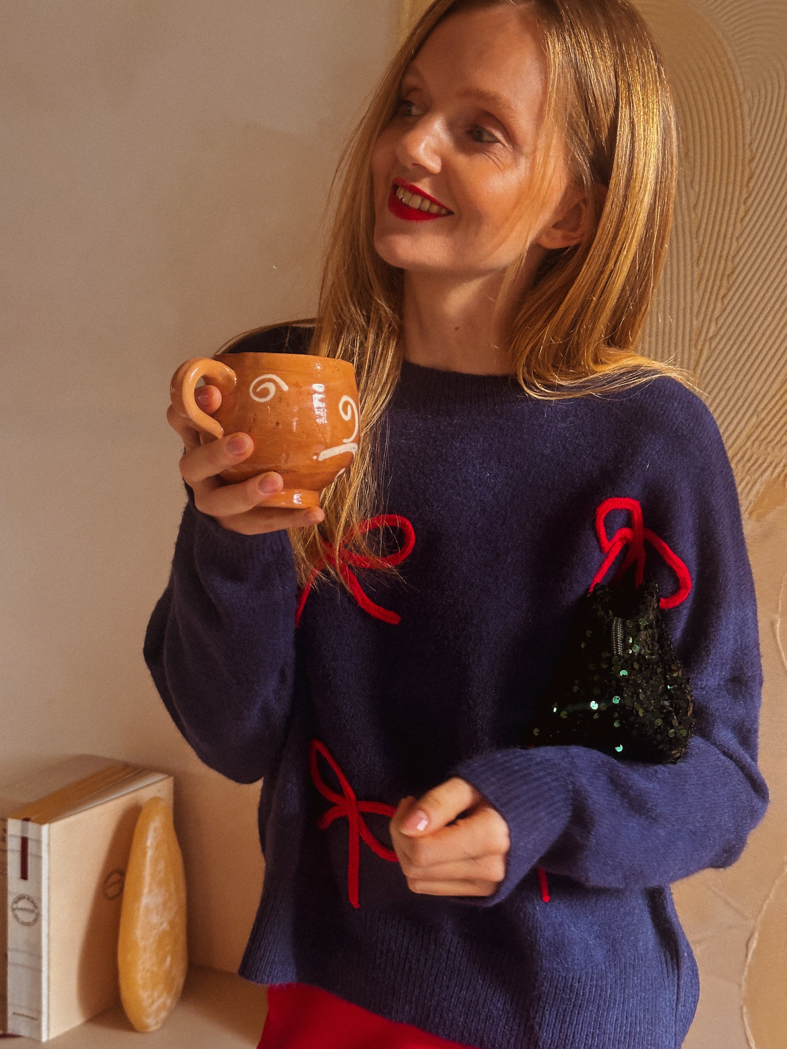 Nina trui blauw met strikjes