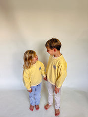 Zita sweater iconic lichtgeel kids