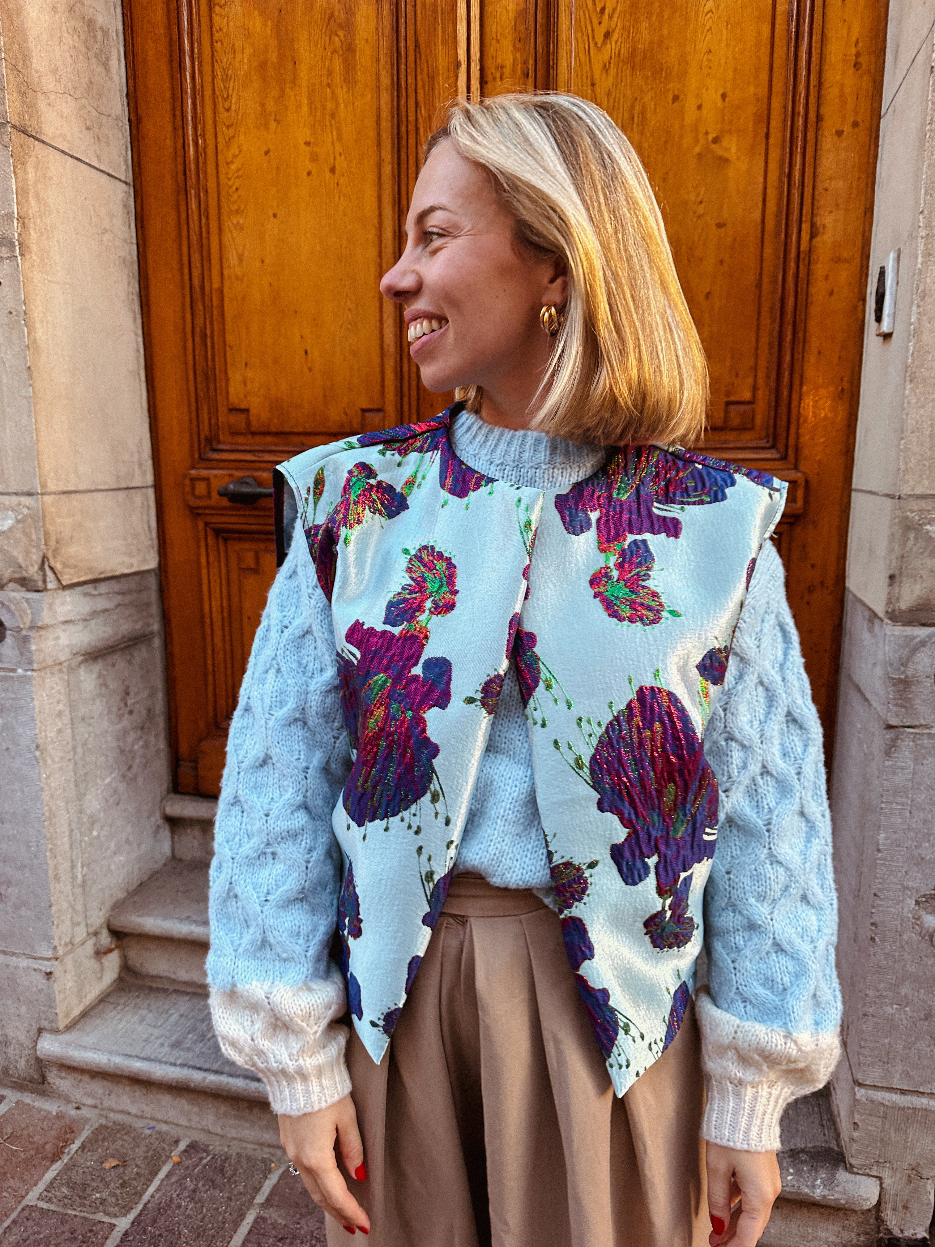 Metallic mouwloos jasje blauw