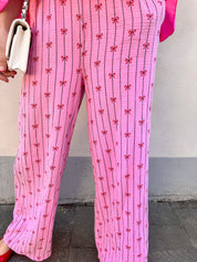 Felien broek roze met rode strikjes