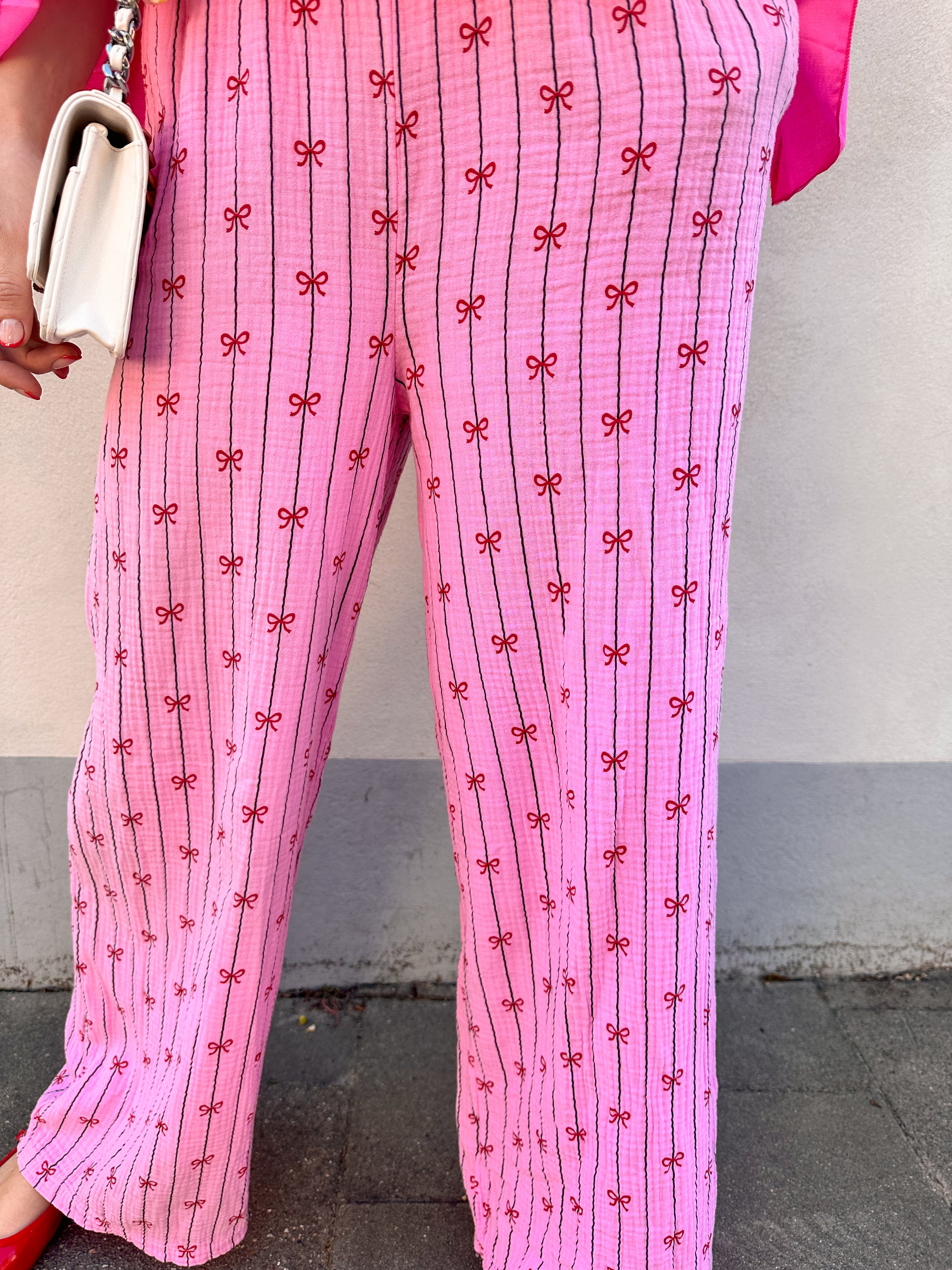 Felien broek roze met rode strikjes