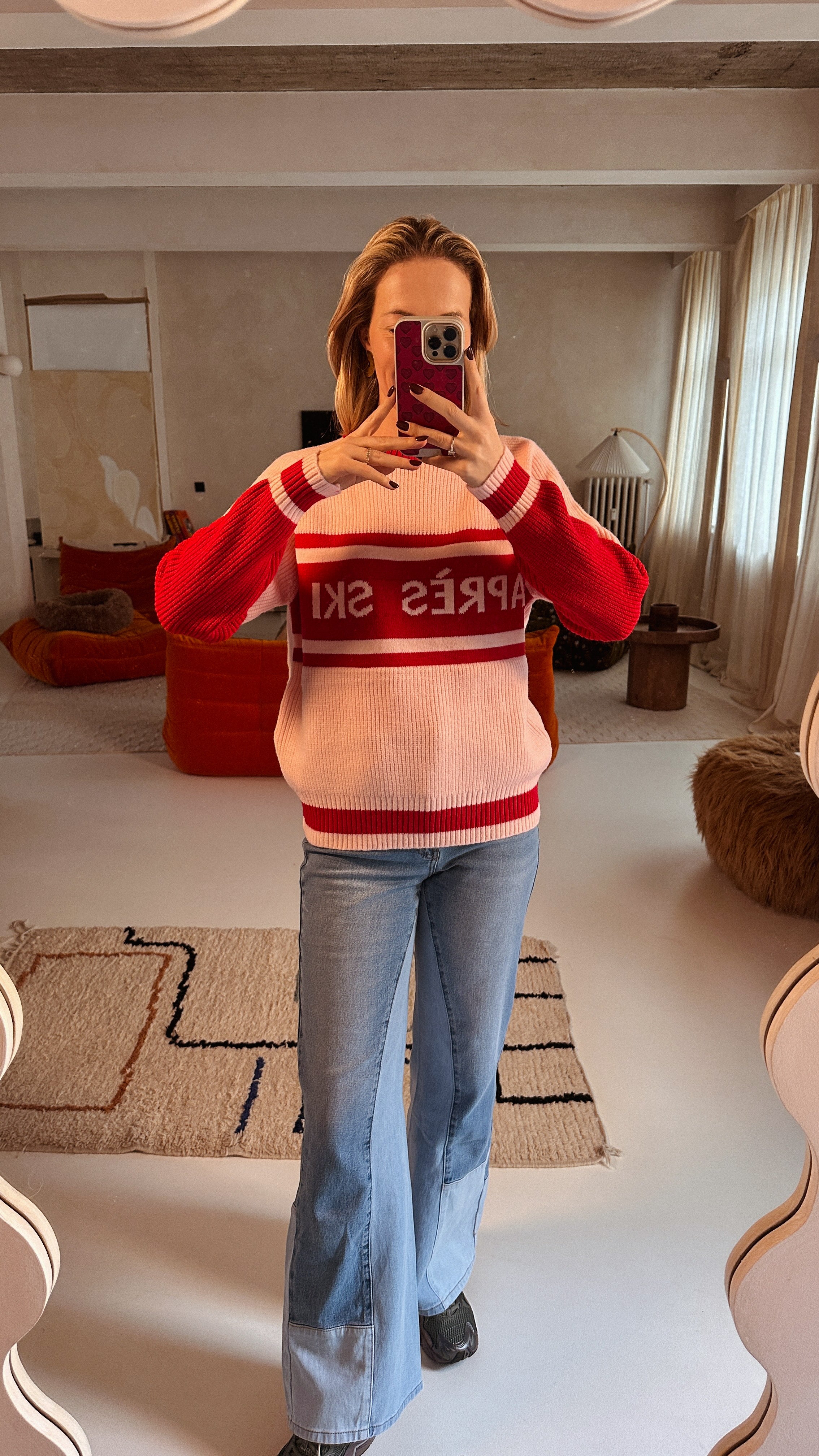 Kira roze trui après ski