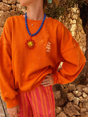 Louise oranje trui Happy place