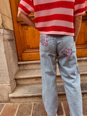 Rose jeans met bloemendetail