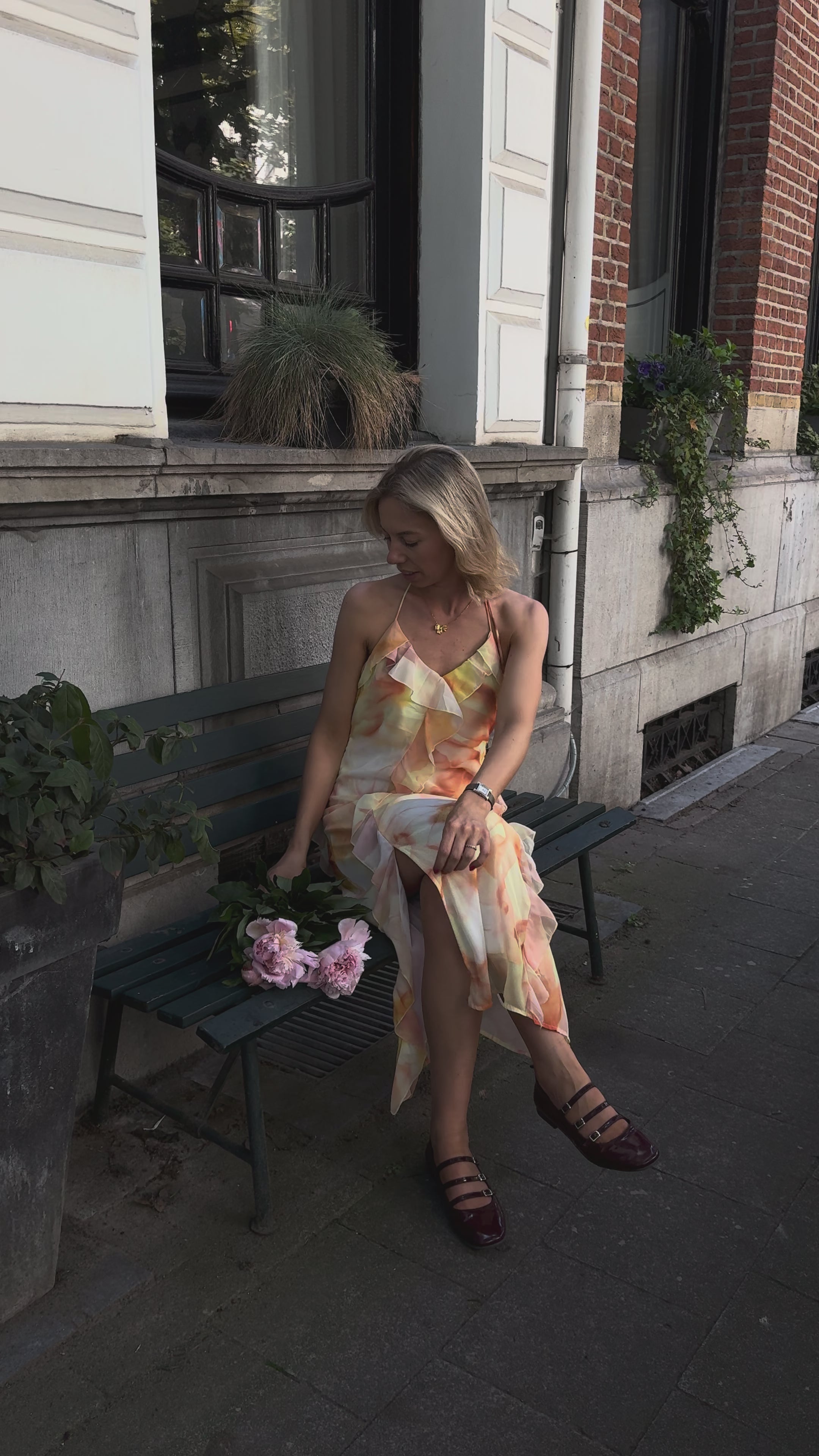 Nayla jurk oranje/geel gebloemd