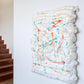Witte foamie met verfspatten